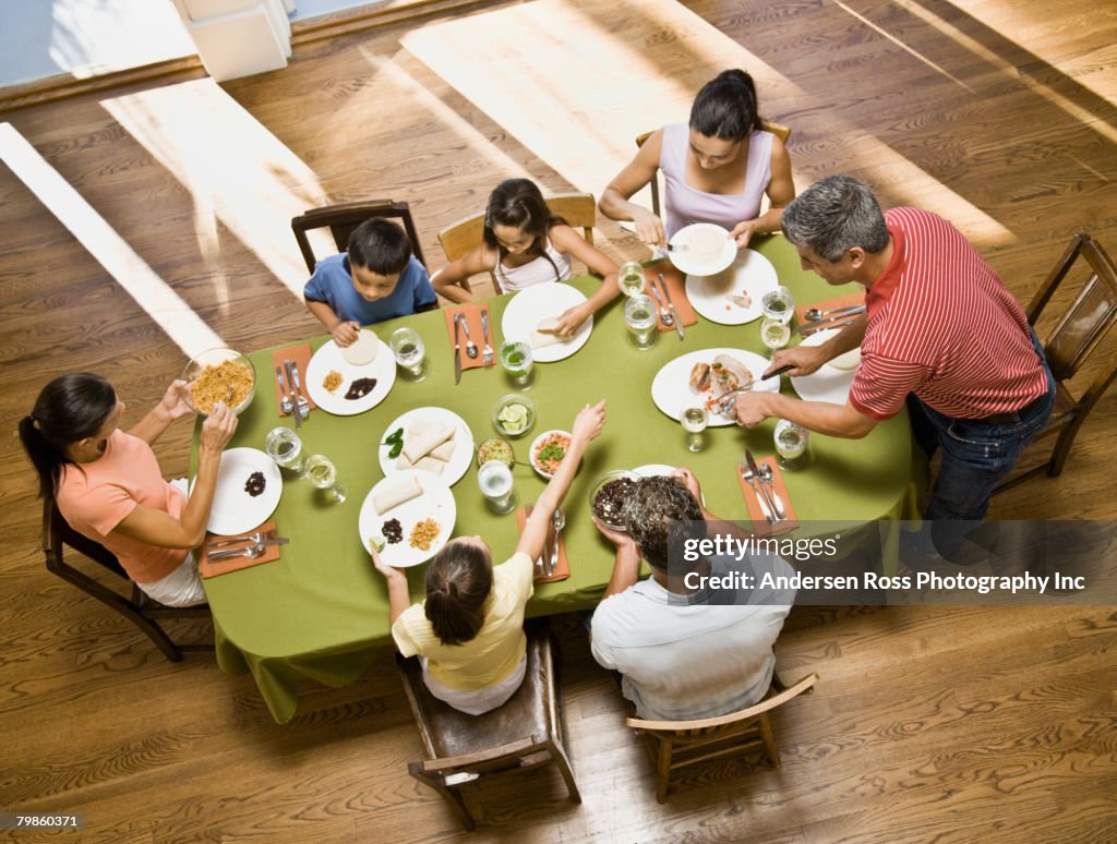 Hispanic family at dinner table