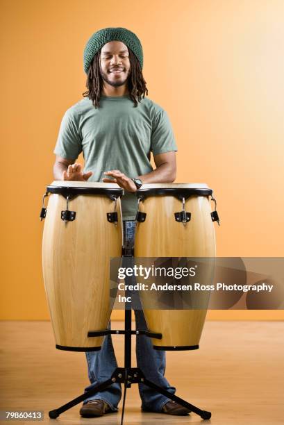 african man playing drums - drum percussion instrument 個照片及圖片檔