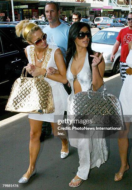 Heiress Paris Hilton nearly causes a riot as she shops with friend Kim Kardashian in Paddington on December 31, 2006 in Sydney, Australia.