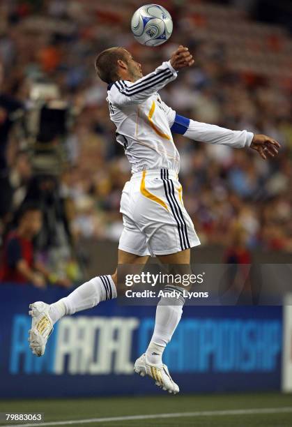David Beckham of the Los Angeles Glaxy tries to keeep the ball in play in the game against Gamba Osaka during the Pan Pacific Championships on...