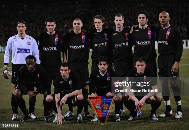 The Lyon team line up prior to the UEFA Champions League first knockout round, first leg match between Lyon and Manchester United at the Stade...