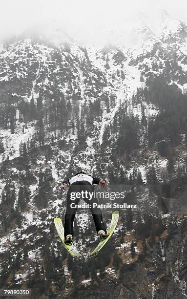 Jumper jumps during the first training session of the FIS Ski Flying World Championships at the Heini Klopfer ski jump arena on February 21, 2008 in...