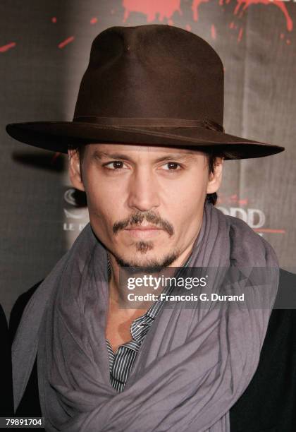 Actor Johnny Depp poses as he attends the "Sweeney Todd" premiere on January 16, 2007 in Paris, France.