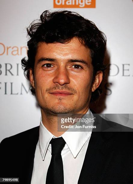 Actor Orlando Bloom poses in the Press Room during The Orange British Academy Film Awards 2008 at The Royal Opera House, Covent Garden on February...