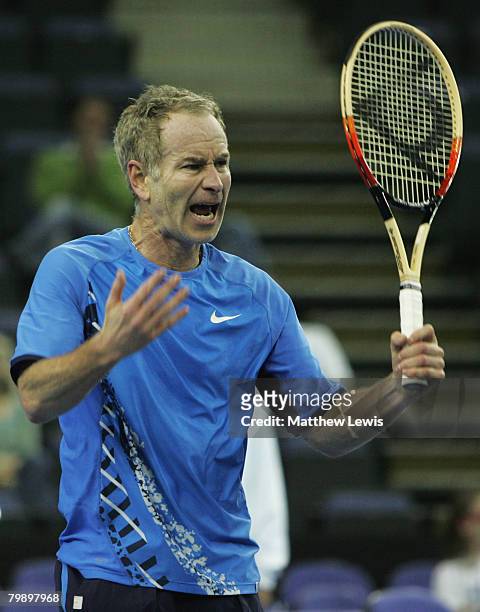John McEnroe of United States shows his frustration during his game against Mikael Pernfors of Sweden during the BlackRock Tour of Champions at the...