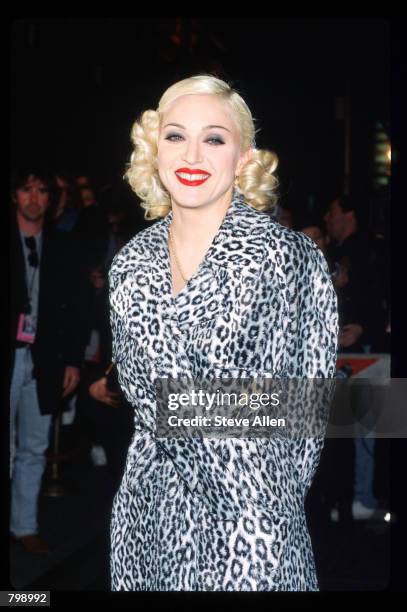 Madonna poses at her Bedtime Story Pajama Party March 18, 1995 at Webster Hall in New York City. The party was hosted by MTV to promote Madonna's...