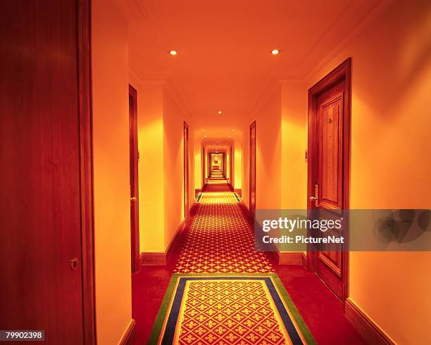hallway of hotel - raute stock-fotos und bilder