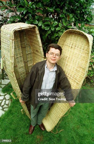 Designer William Wainman with one of his eco-friendly bamboo coffins April 8, 2001 shown as part of the ''Day for the Dead'' event at The Natural...