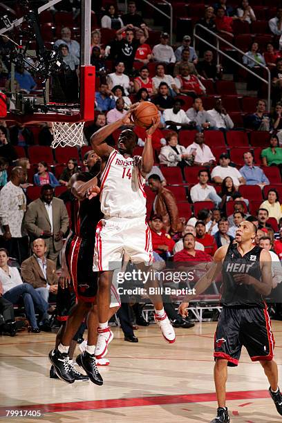Carl Landry of the Houston Rockets shoots the ball against the Miami Heat on February 21, 2008 at the Toyota Center in Houston, Texas. NOTE TO USER:...