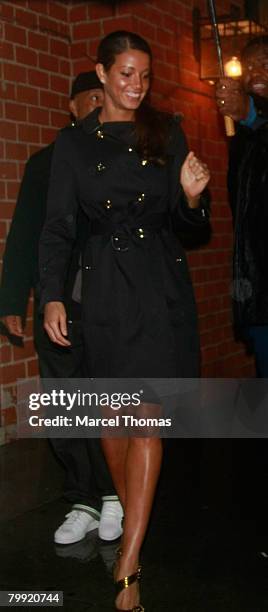 Entrepreneur Russell Simmons and galpal model Porschia Coleman leave Mr Chow's restaurant in Beverly Hills on February 21, 2008 in Los Angeles,...