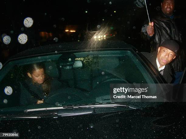 Entrepreneur Russell Simmons and galpal model Porschia Coleman sighting leaving Mr Chow's resturant in Beverly Hills on February 21 2008 in Los...