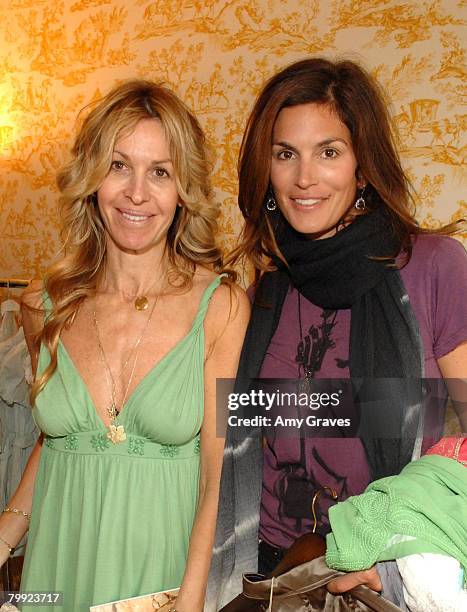 Fashion designer Melissa Odabash poses with supermodel Cindy Crawford during the Melissa Odabash Trunk Show and Luncheon at The Peninsula Hotel on...