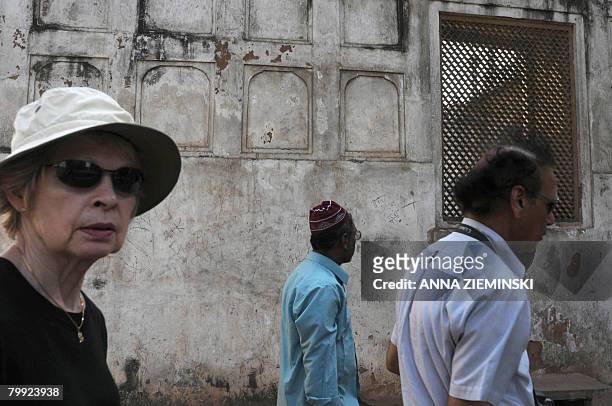 Foreign tourist from the United States walks past The Moti Masjid - Pearl Mosque - of the historic Red Fort which dates back to 1639 and is also a...