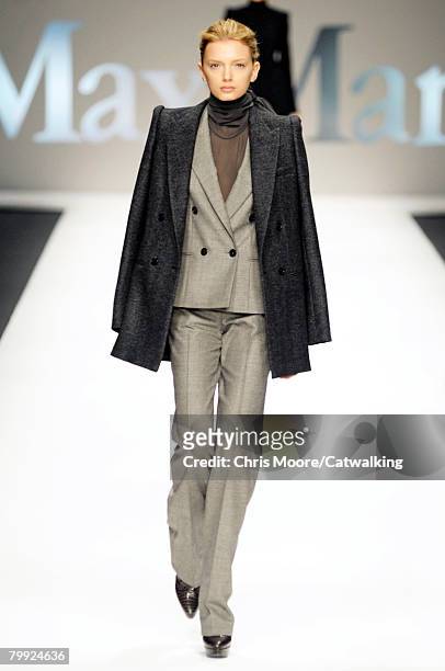 Model Lily Donaldson walks the runway wearing MaxMara at the Fall/Winter 2008/2009 collection during Milan Fashion Week on February 21, 2008 in...