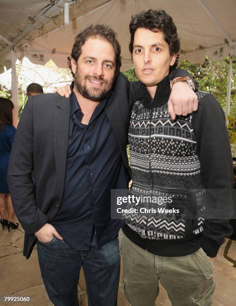 Director Brett Ratner and actor Josh Evans attend a luncheon hosted by legendary producer Robert Evans at a private residence on February 21, 2008 in...