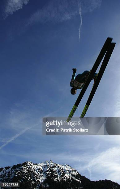 Jumper jumps during the first heat of the FIS Ski Flying World Championships at the Heini Klopfer ski jump arena on February 22, 2008 in Oberstdorf,...