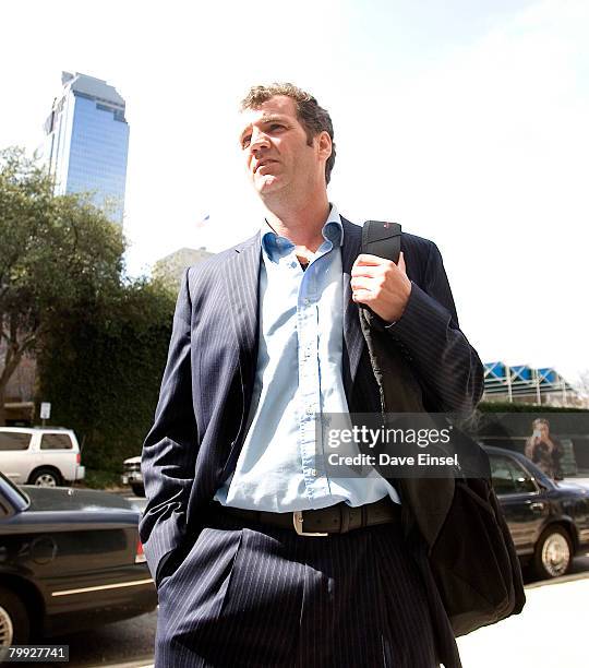 Former NatWest banker Gary Mulgrew stands outside the Bob Casey US Courthouse after being formally sentenced, having pled guilty to a charge of wire...