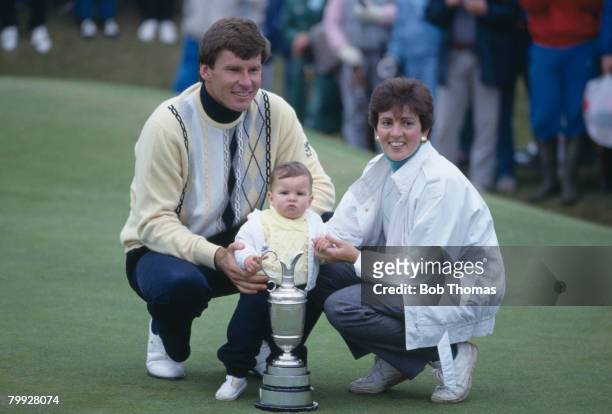 English golfer Nick Faldo celebrates with his wife Gill and baby Natalie after winning the British Open Golf Championship held at Muirfield,...