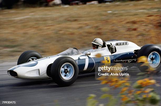 John Surtees in his Ferrari entered by Luigi Chinetti's NART as there was a dispute with Ferrari who would not allow the cars painted in the...