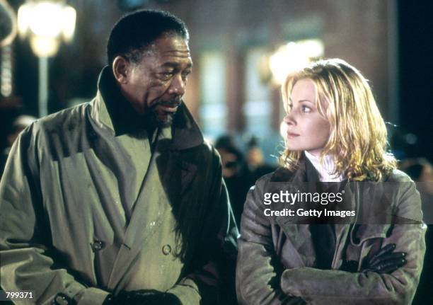 Actor Morgan Freeman performs as Alex Cross and actress Monica Potter performs as Jezzie Flannigan act in a scene from "Along Came A Spider."