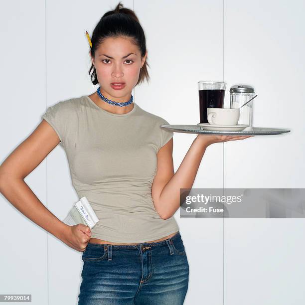 waitress holding tray - overworked waitress stock pictures, royalty-free photos & images
