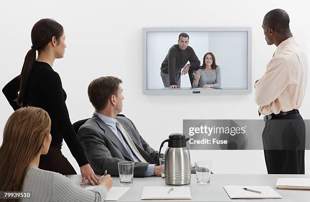 business video conference - neat video stock pictures, royalty-free photos & images