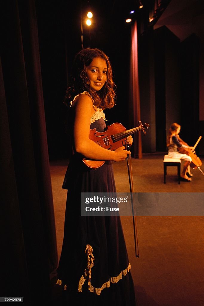 Girl with Violin Waiting to Go on Stage