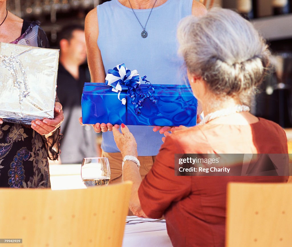 Senior Woman Getting Birthday Presents