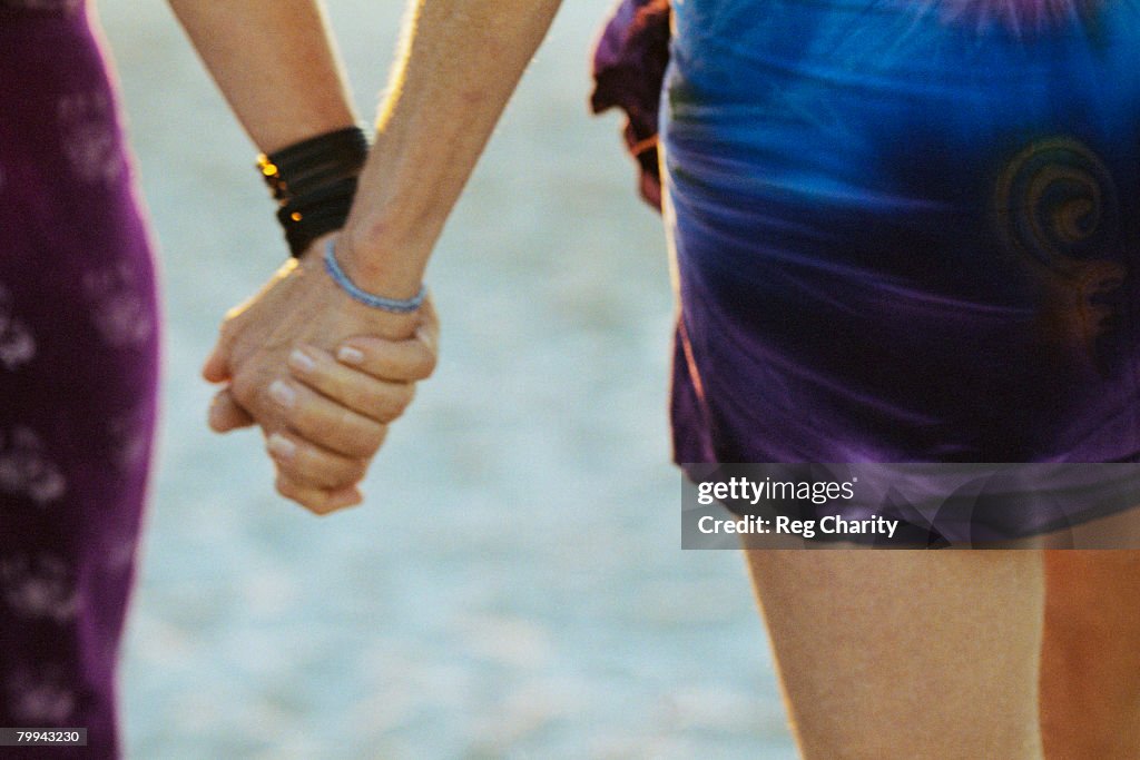 Women Holding Hands