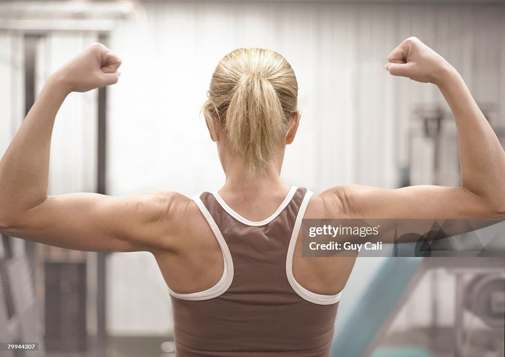 Woman Flexing Her Muscles