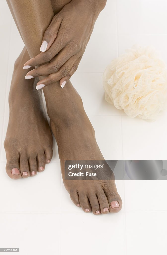Barefeet and Loofah Sponge