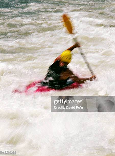 kayaker amidst choppy water - david puu stock-fotos und bilder