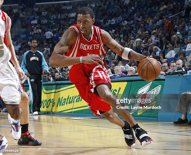 Tracy McGrady of the Houston Rockets drives against the New Orleans Hornets at the New Orleans Arena February 22, 2008 in New Orleans, Louisiana....