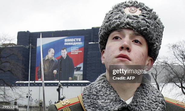 Russian honour guard soldier attends a wreath-laying ceremony at the Unkown Soldier's tomb during a national holiday, the Day of the Fatherland's...