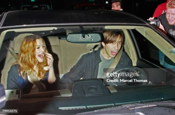 Actress Drew Barrymore and Justin Long visit Mr Chow's restaurant in Beverly Hills on February 22, 2008 in Los Angeles, California.