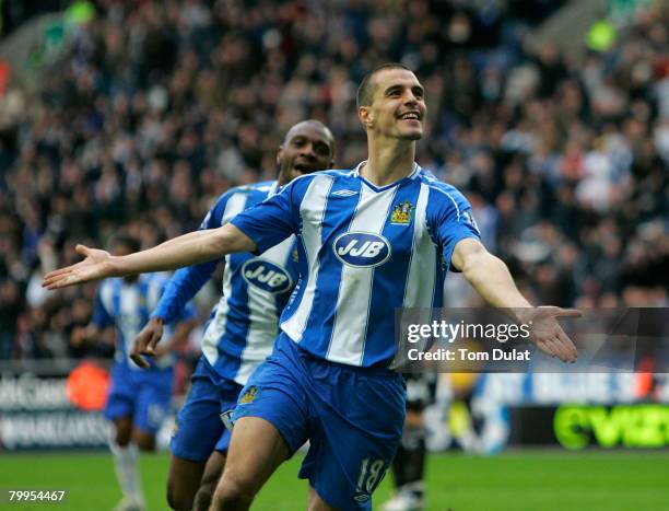 Paul Scharner of Wigan Athletic celebrates his opener during the Barclays Premier League match between Wigan Athletic v Derby County at the JJB...