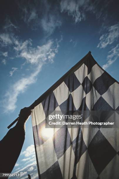 Generic view of the chequered flag as it is held over the start finish line of the track circuit on 13 August 2006 at the Silverstone Circuit in...