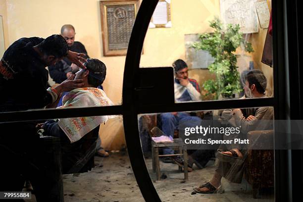 Man has his face shaved February 22, 2008 in Baquba, in Diyala province, Iraq. Baquba was until recently the geographical headquarters of Al Queada...