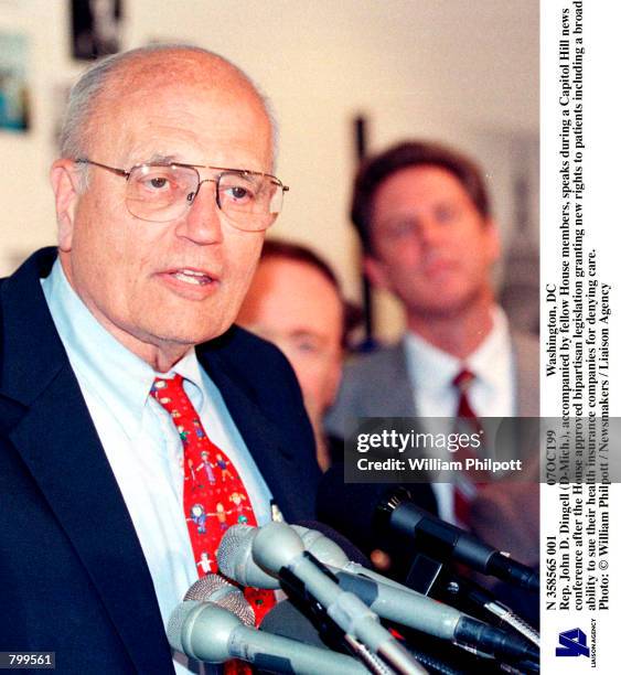 Washington, DC Rep. John D. Dingell , accompanied by fellow House members, speaks during a Capitol Hill news conference after the House approved...