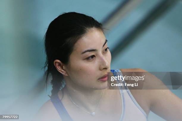 Guo Jingjing of China ,who won the second place, looks on during the women's 3 meter springboard finals of the 'Good Luck Beijing' 2008 16th FINA...