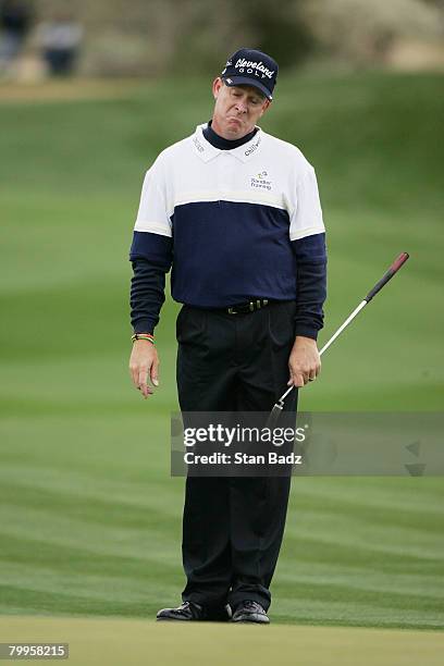 Woody Austin reacts to his putt at the fourth green during the quarterfinal matches of the WGC-Accenture Match Play Championship at The Gallery at...