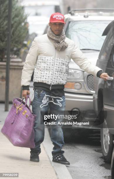 Singer Pharrell Williams leaves his hotel February 23, 2007 in New York City.