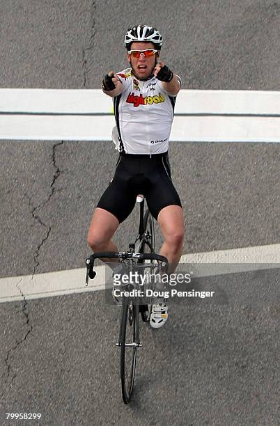 Mark Cavendish of Great Britain and riding for Team High Road celebrates after crossing the finish line but was forced to reliquish the win when he...