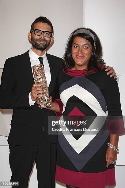 Director Vincent Paronnaud and Iranian cartoonist Marjane Satrapi pose in the award room at Cesar Film Awards 2008 at Theatre du Chatelet on February...