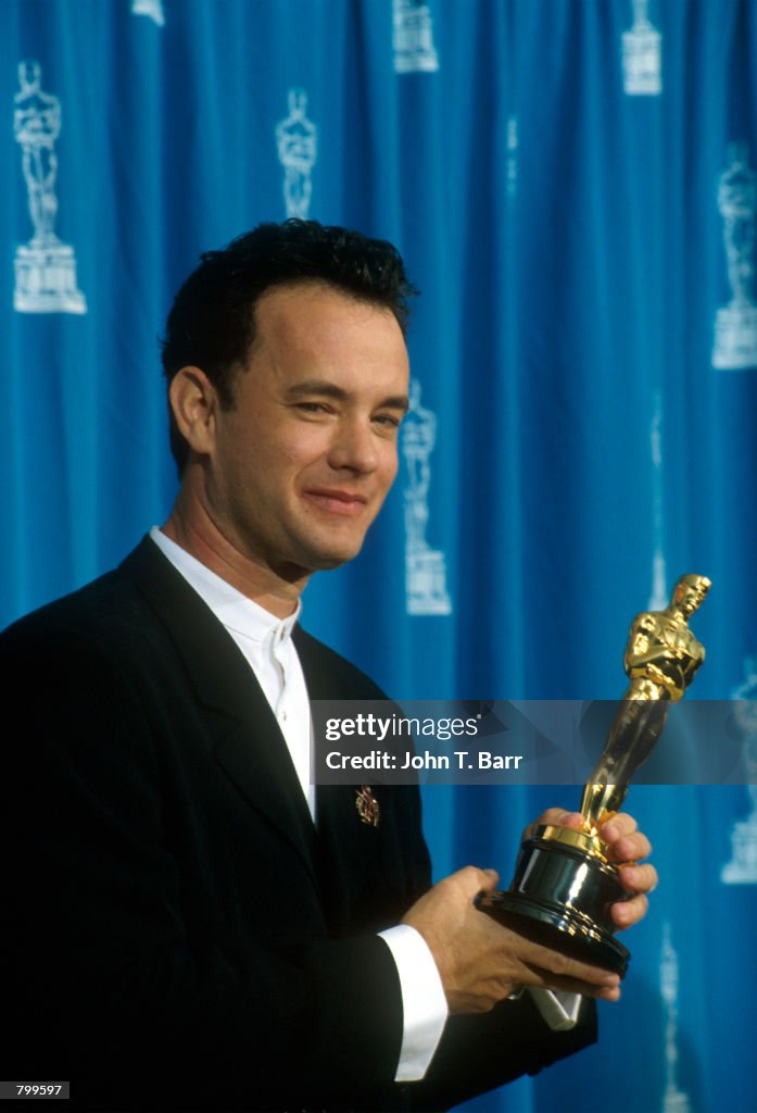 Actor Tom Hanks Receives His Oscar At The Academy Awards In Los News