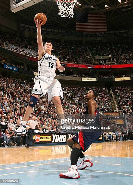 Matt Harpring of the Utah Jazz makes a layup over Jeremy Richardson of the Atlanta Hawks on February 23, 2008 at Energy Solutions Arena in Salt Lake...