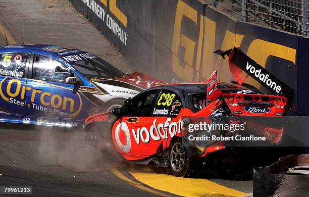Craig Lowndes of Team Vodafone crashes out during race two of the Clipsal 500 which is round one of the V8 Supercar Championship Series on the...