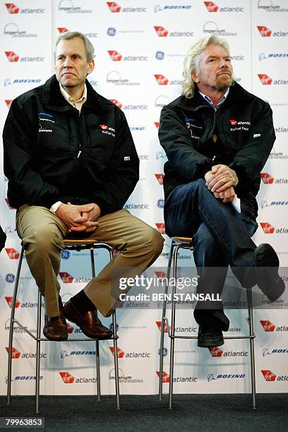 Virgin Atlantic chief Richard Branson poses with Boeing's vice-president Martin Dailey before the departure of the first test flight using bio-fuel...