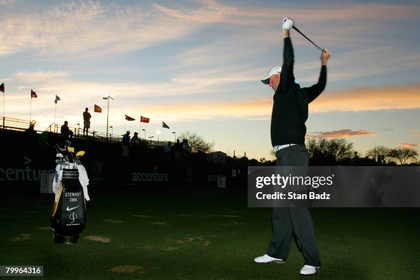 Stewart Cink warms up on the practice range before the Championship match of the WGC-Accenture Match Play Championship at The Gallery at Dove...