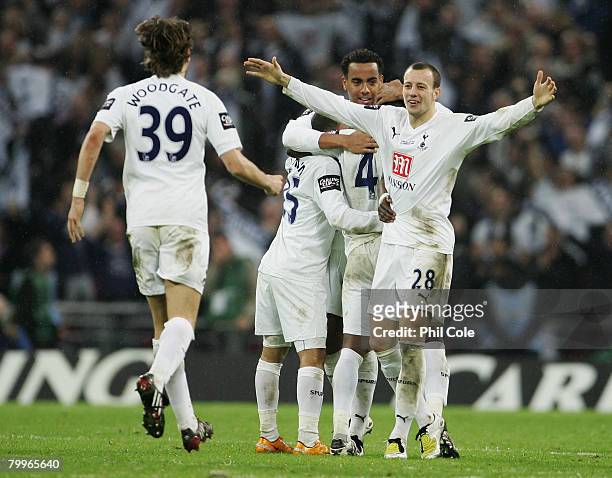 Jonathan Woodgate and Alan Hutton of Tottenham Hotspur celebrate victory following the Carling Cup Final between Tottenham Hotspur and Chelsea at...